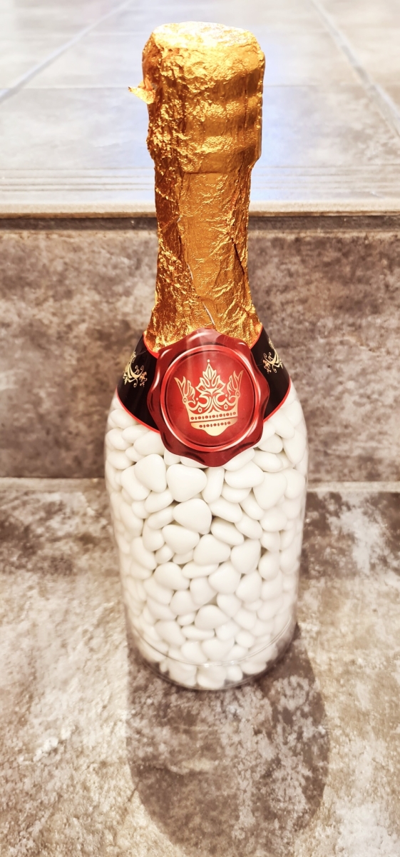 Sektflasche mit Dragees Weiß